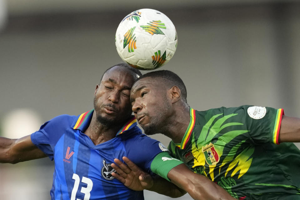 Namibia's Peter Shalulile, left, goes for the header with Mali's Moussa Diarra, during the African Cup of Nations Group E soccer match between Namibia and Mali, at the Laurent Pokou Stadium in San Pedro, Ivory Coast, Wednesday, Jan. 24, 2024. (AP Photo/Sunday Alamba)