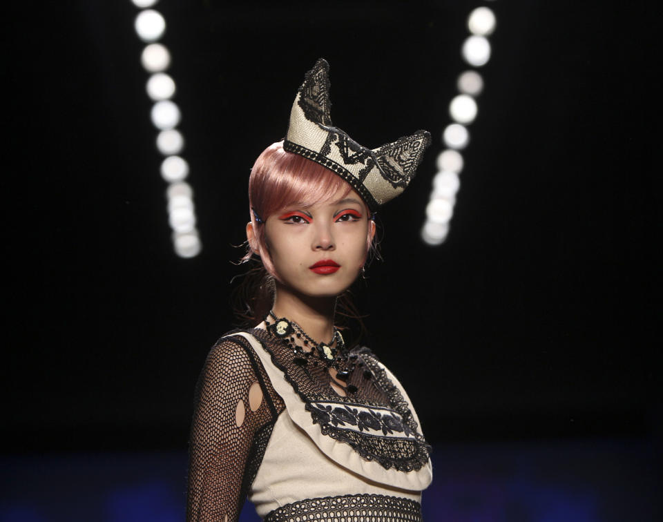 A model wears a design from Anna Sui's Spring 2013 collection during Fashion Week in New York, Wednesday, Sept. 12, 2012.  (AP Photo/Seth Wenig)