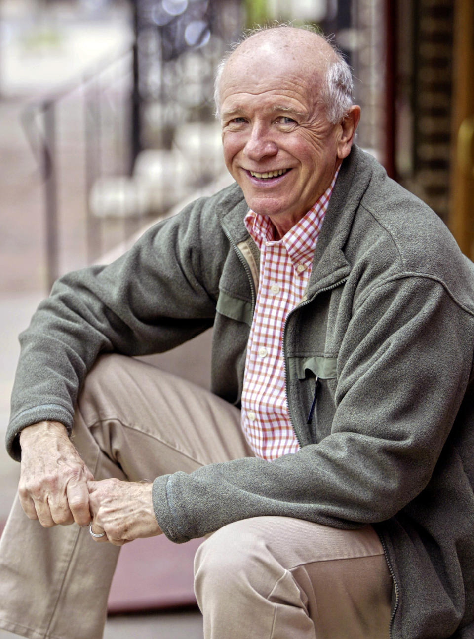 FILE - This May 14, 2006 file photo shows Tony Award winning playwright Terrence McNally in front of the Philadelphia Theater Company in Philadelphia. McNally, one of America’s great playwrights whose prolific career included winning Tony Awards for the plays "Love! Valour! Compassion!" and "Master Class" and the musicals "Ragtime" and "Kiss of the Spider Woman," died Tuesday, March 24, 2020, of complications from the coronavirus. He was 81. (AP Photo/H. Rumph Jr)