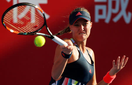 Tennis - Hong Kong Open semi-finals - Daria Gavrilova of Australia v Kristina Mladenovic of France - Hong Kong, China - 15/10/16. Mladenovic returns a shot. REUTERS/Bobby Yip