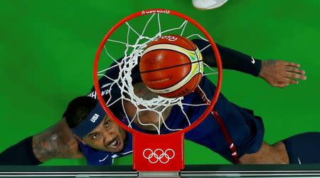 2016 Rio Olympics - Basketball - Semifinal - Men's Semifinal Spain v USA - Carioca Arena 1 - Rio de Janeiro, Brazil - 19/8/2016. Carmelo Anthony (USA) of the USA looks at the ball. REUTERS/Jim Young