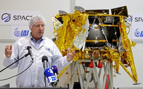 Israeli Aerospace Industries director of Space division Opher Doron speaks in front a spacecraft - Credit: &nbsp;JACK GUEZ/&nbsp;AFP