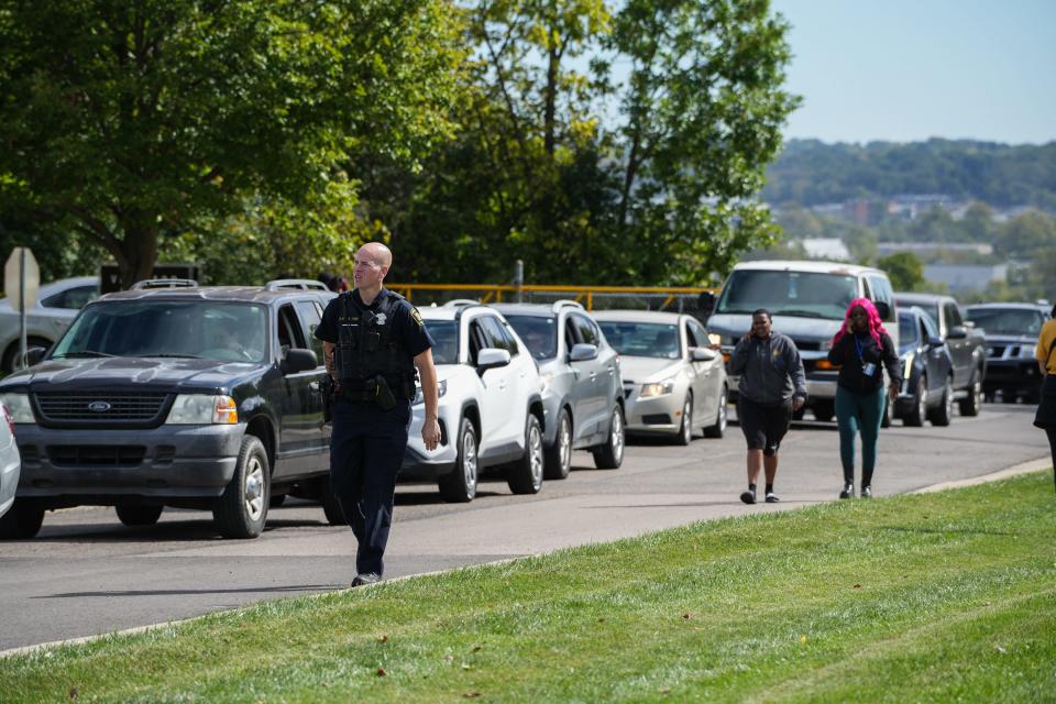 Emergency services respond to reports of a shooting at Princeton High School. Police direct parents to Vineyard church down the street from Princeton to pick up their kids.