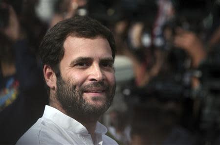 Rahul Gandhi, a lawmaker and son of India's ruling Congress party chief Sonia Gandhi, smiles as he speaks with the media in New Delhi in this March 6, 2012 file photo. REUTERS/Parivartan Sharma/Files