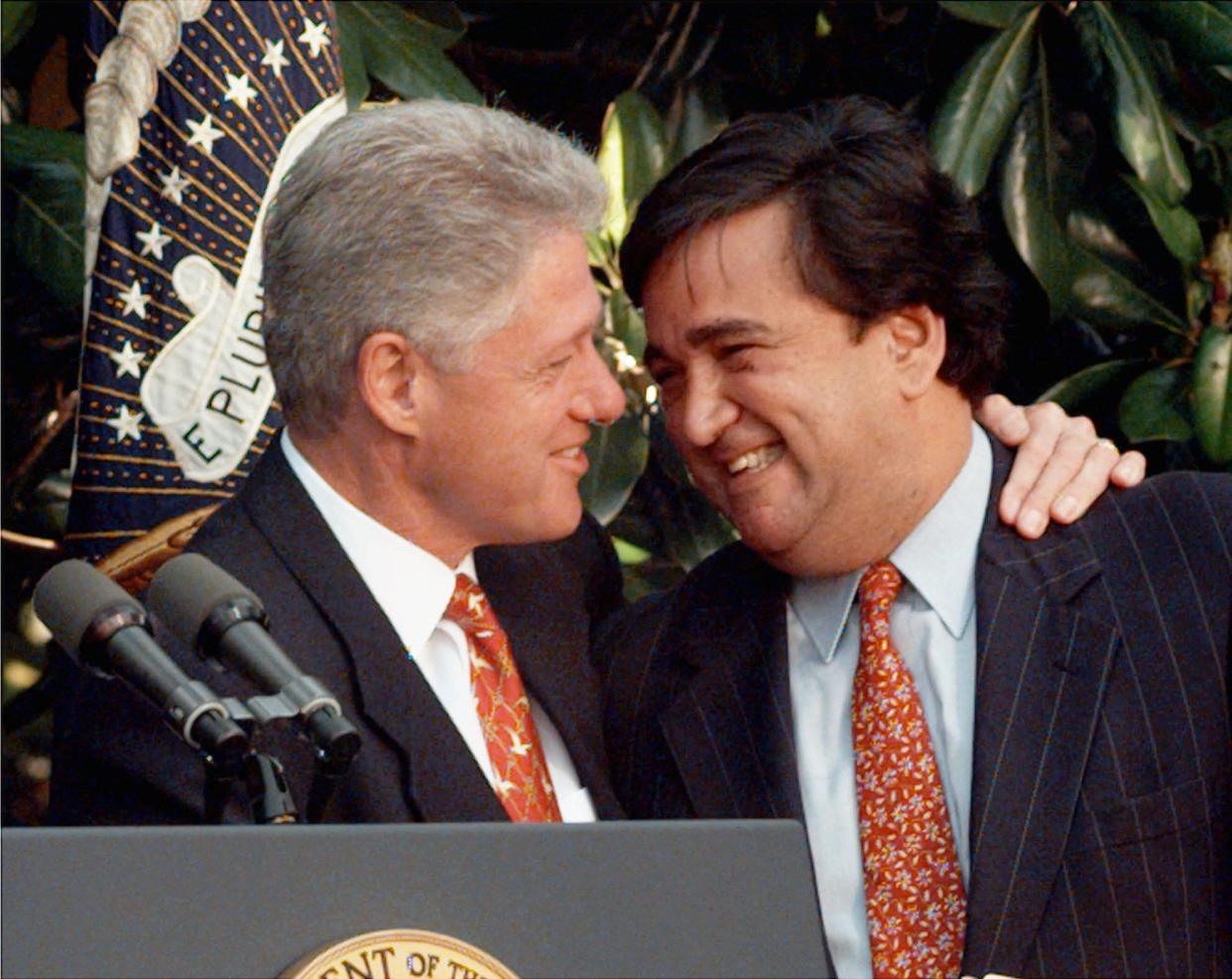 President Clinton, left, embraces Bill Richardson, then U.S. Ambassador to the United Nations, at a White House Rose Garden ceremony June 18, 1998. Clinton announced that Richardson was going to become the new Secretary of Energy.