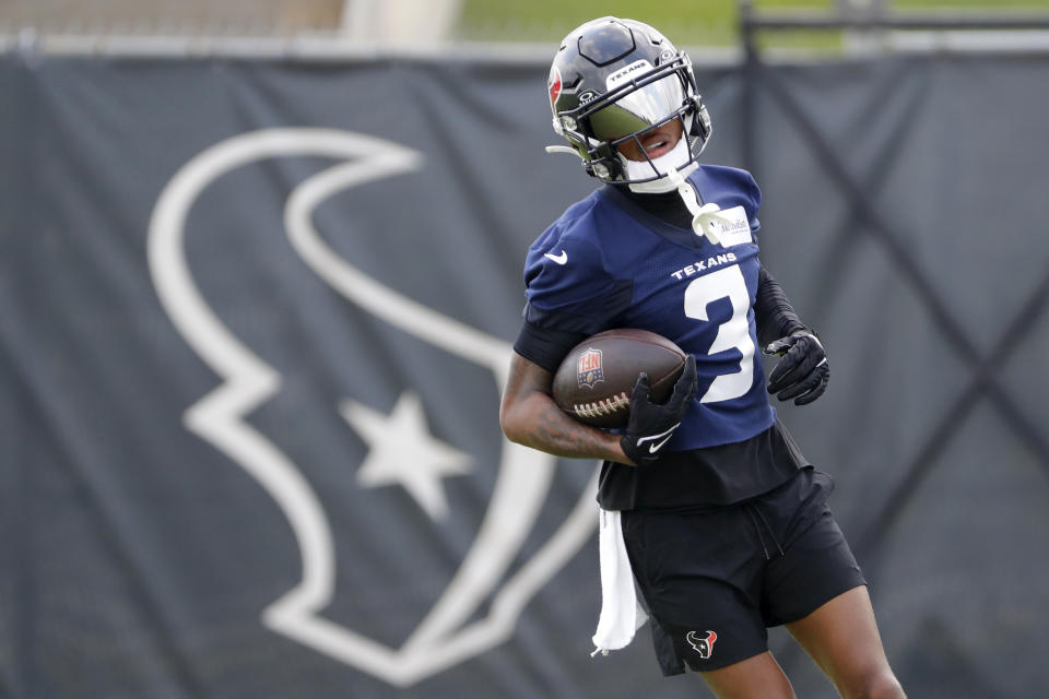 Houston Texans wide receiver Tank Dell runs a play during practice at the NFL football team's minicamp, Tuesday, June 4, 2024, in Houston. (AP Photo/Michael Wyke)