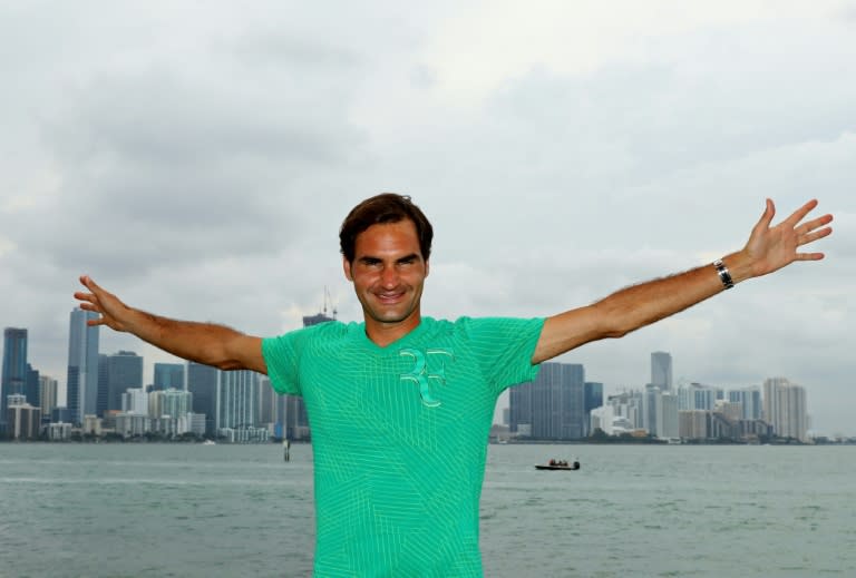 Roger Federer of Switzerland celebrates after defeating Rafael Nadal of Spain to win the Miami Open title, at Crandon Park Tennis Center in Key Biscayne, Florida, on April 2, 2017