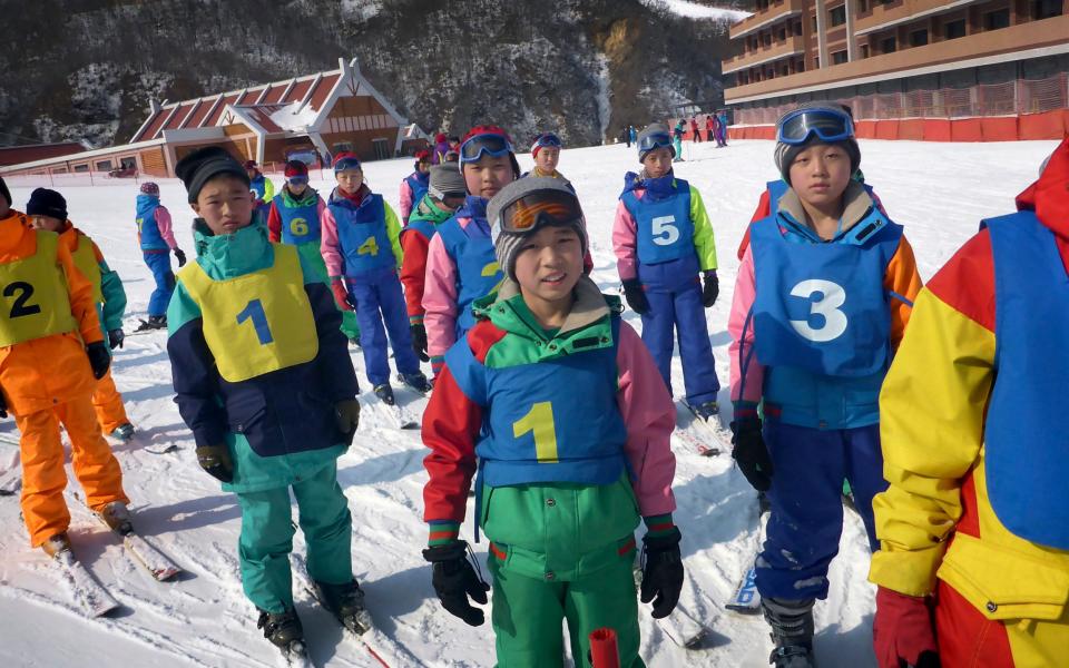 North Korean children attend a ski class, at the Masik Pass Ski Resort in Wonsan - Credit: AP