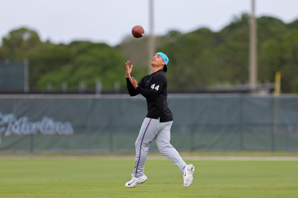 Feb. 17: Miami Marlins pitcher Jesus Luzardo catches a football during a spring training workout at the Marlins Player Development & Scouting Complex.