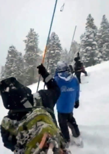 <em>Nevada Task Force 1 search and rescue crews looked for any unreported missing people possibly caught in Tuesday’s avalanche at Lee Canyon. (Credit: Clark County)</em>