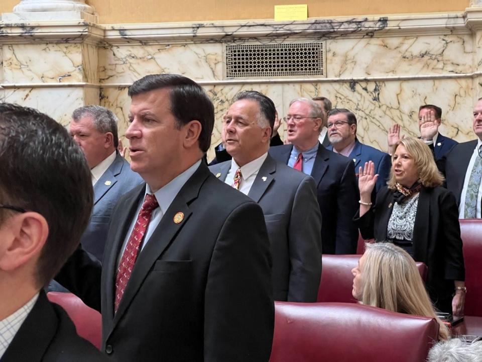 Maryland state senators are sworn in on the first day of the legislative session on Jan. 11, 2023 in Annapolis. At center, Republican state Sen. Johnny Ray Salling,, Baltimore County, raises his right hand.