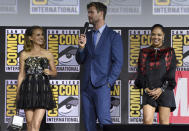 Natalie Portman, from left, Chris Hemsworth and Tessa Thompson participate during the "Thor Love And Thunder" portion of the Marvel Studios panel on day three of Comic-Con International on Saturday, July 20, 2019, in San Diego. (Photo by Chris Pizzello/Invision/AP)