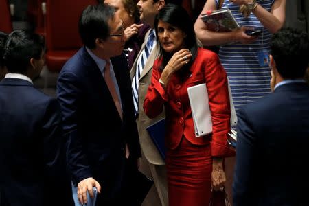 U.S. Ambassador to the United Nations Nikki Haley and South Korean Ambassador to the U.N. Cho Tae-yul speak after a U.N. Security Council meeting to discuss the recent ballistic missile launch by North Korea at U.N. headquarters in New York, U.S., July 5, 2017. REUTERS/Mike Segar