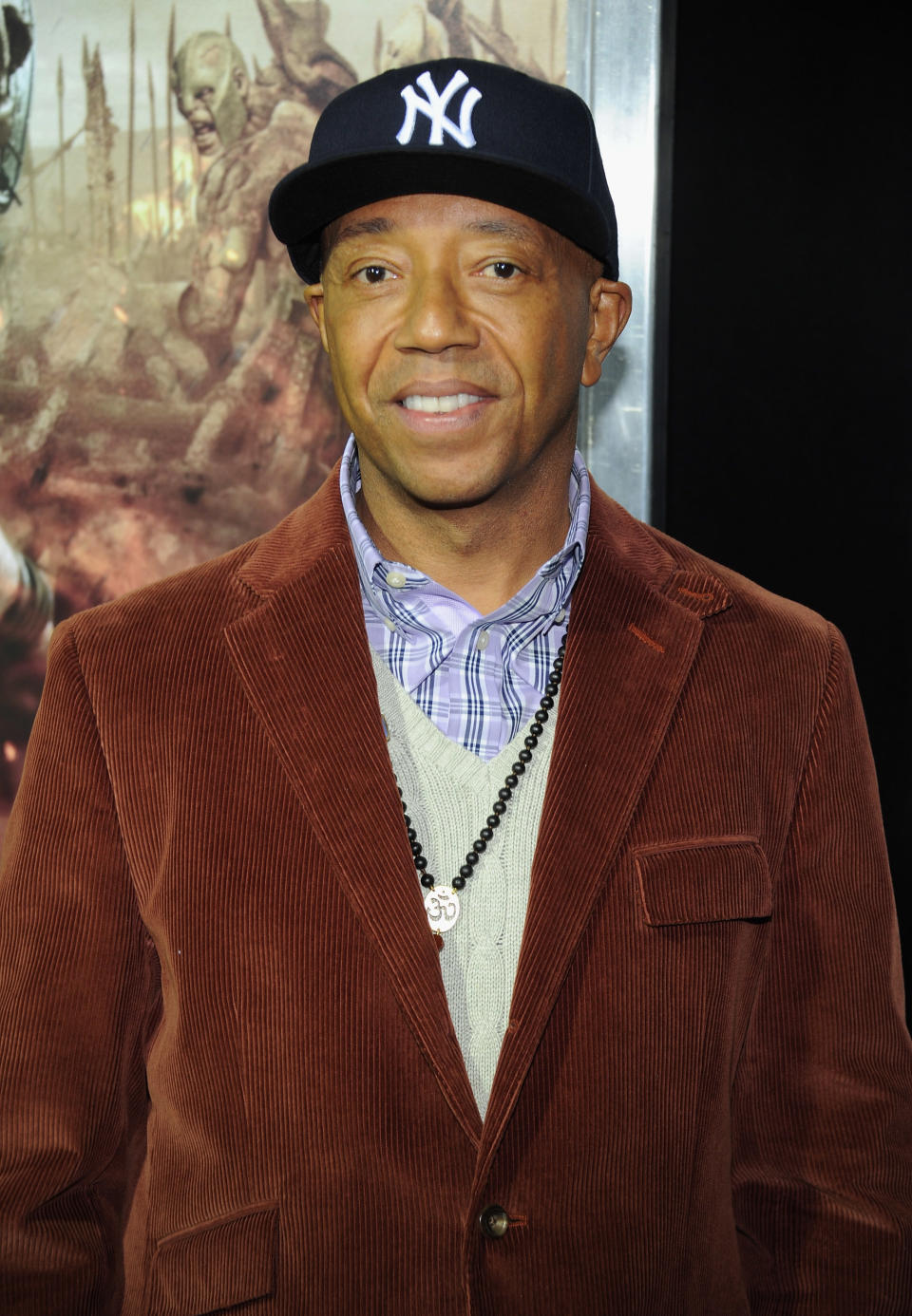 NEW YORK, NY - MARCH 26: Russell Simmons attends the "Wrath of the Titans" premiere at the AMC Lincoln Square Theater on March 26, 2012 in New York City. (Photo by Larry Busacca/Getty Images)
