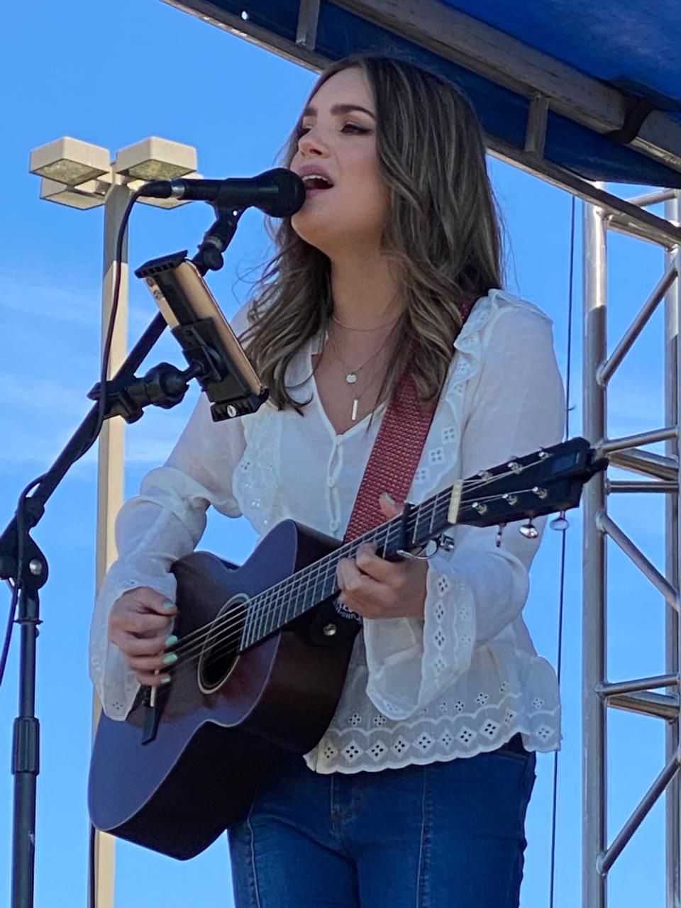 Stark County native Lauren Mascitti, shown performing in Hartville in October, will headline a free concert benefiting first responders on May 21 at Centennial Plaza. Mascitti is a former "American Idol" contender.