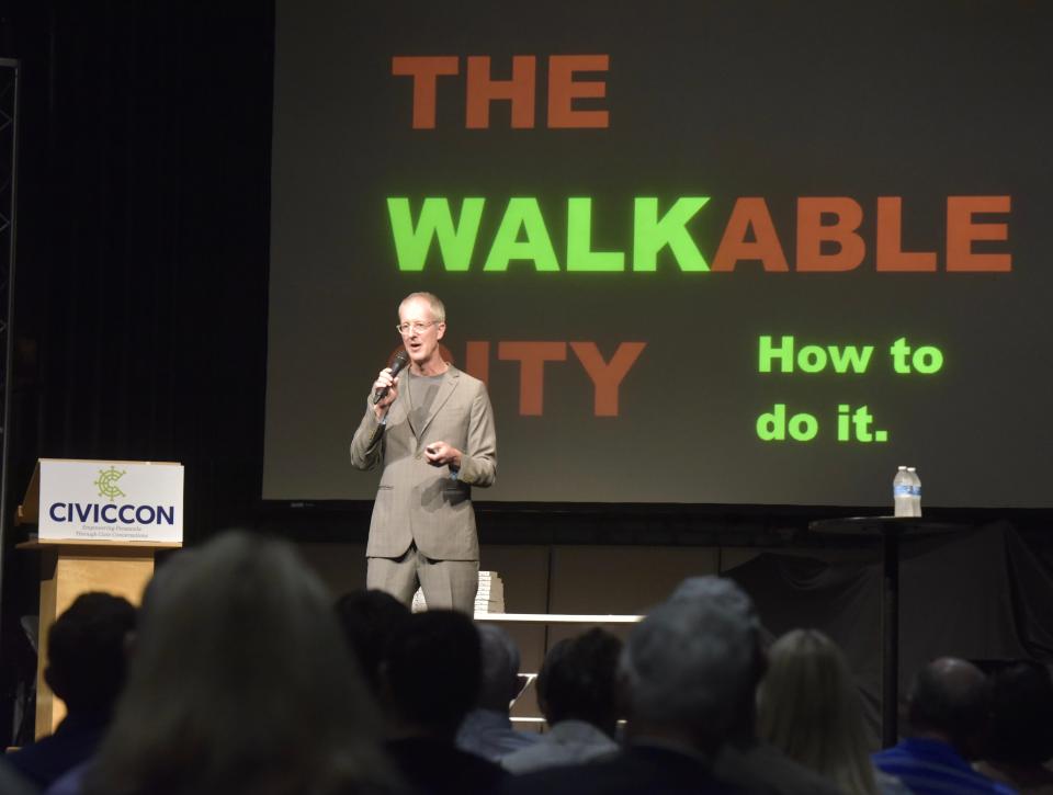 Jeff Speck, an urban planner and former director of design at the National Endowment for the Arts, discusses the importance of designing walkable cities during a CivicCon presentation Monday, Sept. 17, 2018, at the REX Theatre in downtown Pensacola.