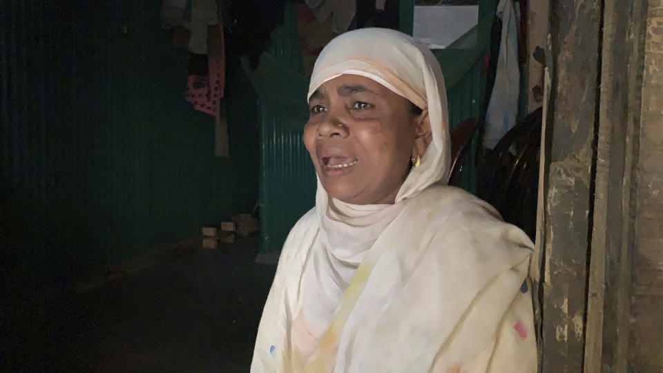 Rohingya refugee Nasima Khatun, mother of a 25-year-old man stranded on a boat, speaks with the Associated Press at Kutupalong refugee camp in Cox’s Bazar district, Bangladesh, Wednesday, Feb. 24, 2021. A group of Rohingya refugees is adrift in a boat in the Andaman Sea without food or water, the United Nations said Wednesday, as their families worried that many may have already died. “Oh Allah, save all of the people that are stuck in the boat including my son with your divine magic. Put them somewhere on the coast of the river. Please fulfill the wishes of my son to go there,” said Khatun. (AP Photo/Shafiqur Rahman)