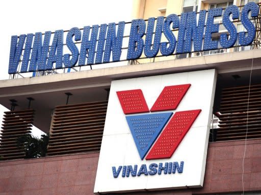 Logo of Vietnam's state-owned shipbuilder Vinashin group is pictured at its headquarters in Hanoi, in 2010. Former top executives at the Vietnamese shipbuilder whose huge debts shook investor confidence in the communist nation went on trial on Tuesday for defying state regulations