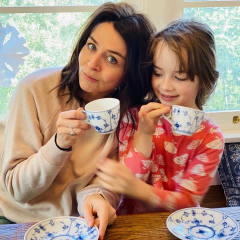 <p>Caterina Scorsone/Instagram</p> Caterina Scorsone having a tea party with her daughter Eliza in December 2020