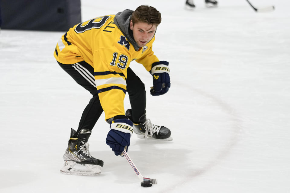 NHL draft prospect Adam Fantilli skates with the puck during a youth hockey clinic with other draft prospects and members of the NHL Player Inclusion Coalition, Tuesday, June 27, 2023, in Nashville, Tenn. (AP Photo/George Walker IV)