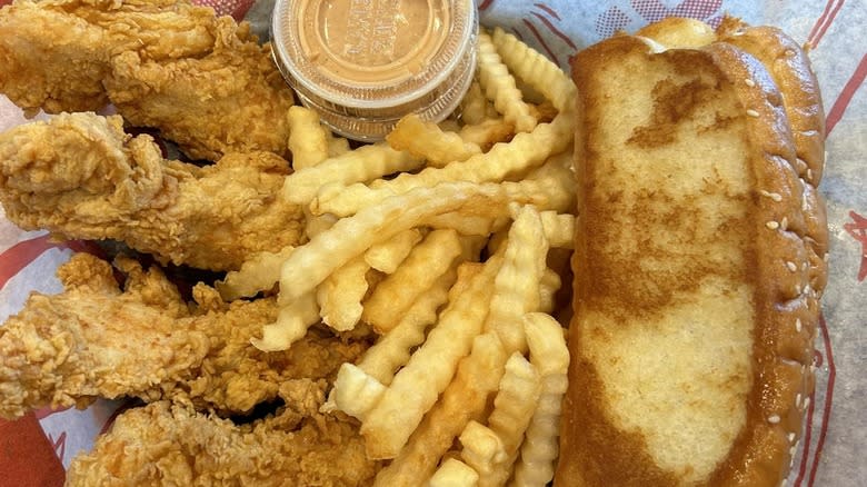 chicken fingers, fries, toast, and sauce