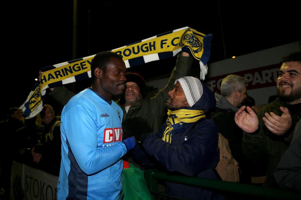 Haringey Borough goalkeeper Valery Pajetat acknowledges fans after the final whistle during the FA Cup fourth qualifying round replay match at Coles Park Stadium, London: PA