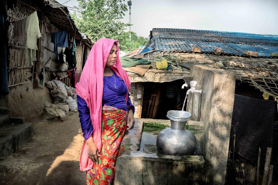 Rahima Khatun said she had not wanted her 17-year-old son, Mohammad Hossain, to leave the camp, but “there is no option without escape from here.” (Fabeha Monir for NBC News)