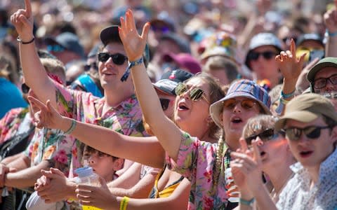 The band may have been bland, but the audience bring some colour in the form of Hawaiian shirts and flower leis - Credit: Geoff Pugh