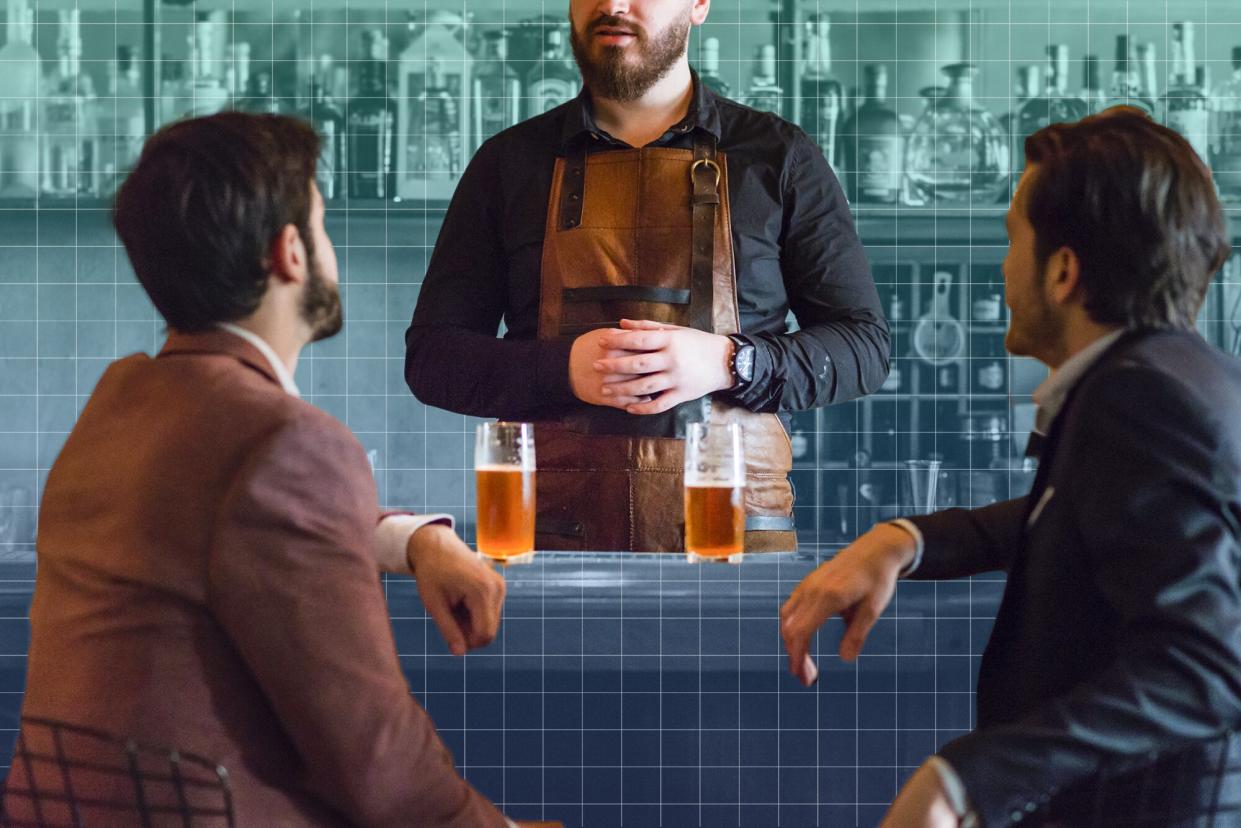 bartender talking to two customers