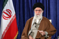 In this picture released by the official website of the office of the Iranian supreme leader, Supreme Leader Ayatollah Ali Khamenei addresses the nation in a televised speech, in Tehran, Iran, Thursday, April 9, 2020. Iran's supreme leader suggested Thursday that mass gatherings in the Islamic Republic may be barred through the holy Muslim fasting month Ramadan amid the new coronavirus pandemic. (Office of the Iranian Supreme Leader via AP)