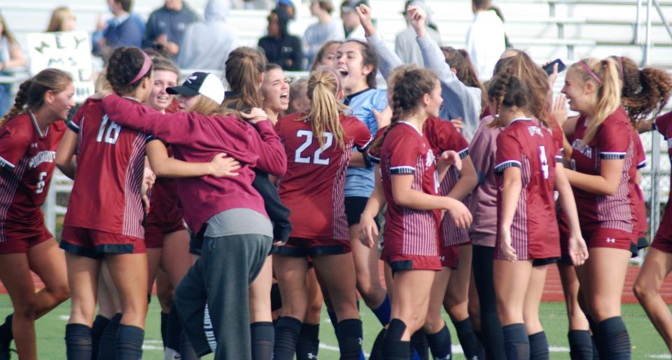 Members of the Portsmouth High School girls soccer team celebrate after Sunday's 3-2 win over Exeter in a Division I quarterfinal game at Tom Daubney Field.