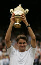 <p>Federer beat Andy Roddick in straight sets to lift the Wimbledon trophy on July 3, 2005, </p>