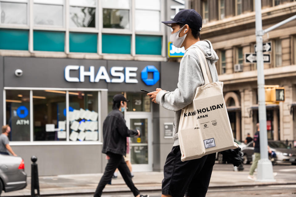 NEW YORK, NEW YORK - SEPTEMBER 29: A person wears a face mask outside Chase bank in Union Square as the city continues Phase 4 of re-opening following restrictions imposed to slow the spread of coronavirus on September 29, 2020 in New York City. The fourth phase allows outdoor arts and entertainment, sporting events without fans and media production. (Photo by Noam Galai/Getty Images)