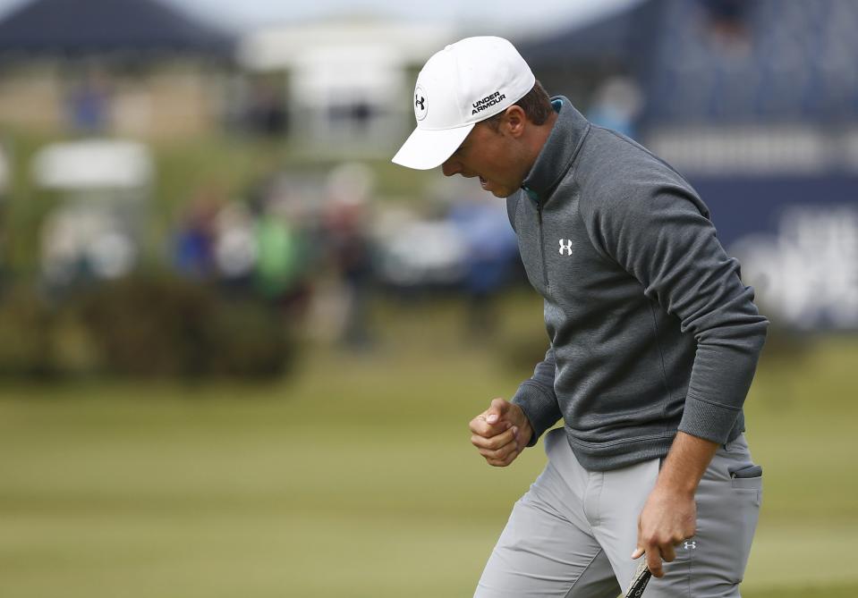 Jordan Spieth reacts after his par putt on the 17th hole. (REUTERS)