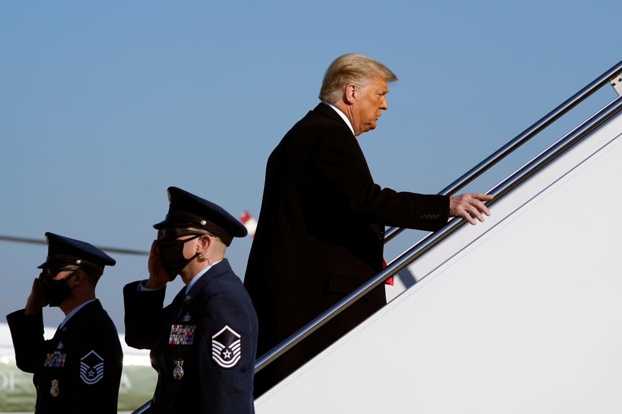 President Donald Trump boards Air Force One at Andrews Air Force Base, Md.