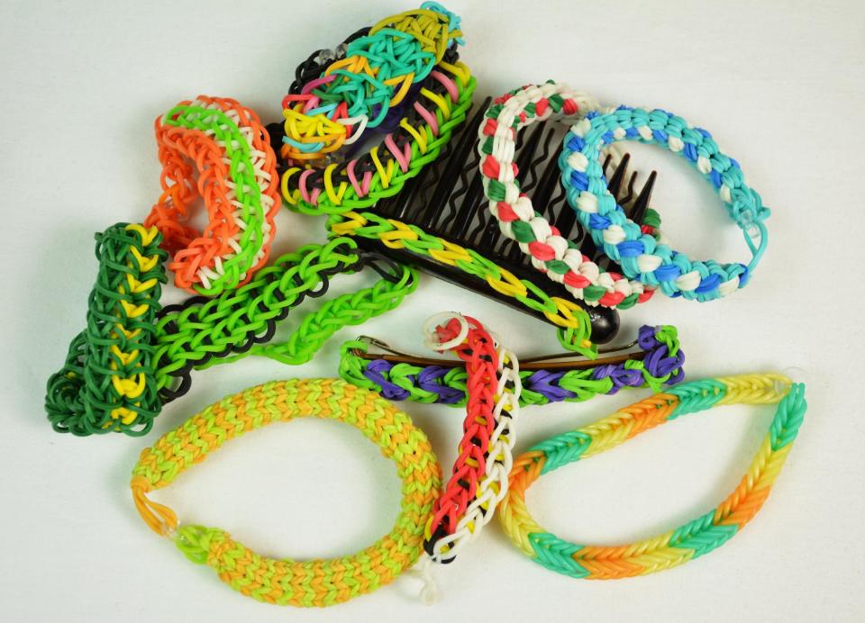 This photo provided by courtesy of Choon's Design shows Rainbow Loom bracelets. In a market glutted with craft products marketed specifically to girls, Rainbow Loom is a rare gender-neutral craft kit, helping boys develop fine motor skills and longer attention spans while they create gifts to share with friends and family. (AP Photo/Choon's Design)