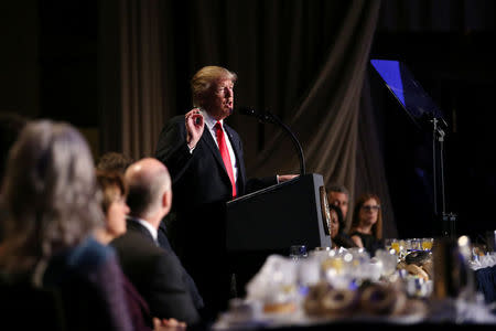 U.S. President Donald Trump delivers remarks at the National Prayer Breakfast in Washington, U.S., February 2, 2017. REUTERS/Carlos Barria