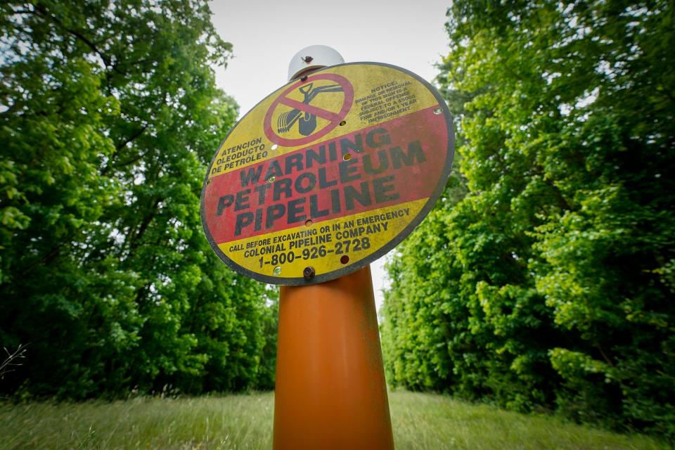 A ransomware attack on the Colonial Pipeline Co. has raised awareness that cyber assaults could have serious consequences. A sign marking the location of the Colonial Pipeline is posted in Charlotte, N.C.