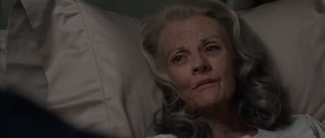 An elderly Peggy Carter lying in her bed in "Captain America: The Winter Soldier"