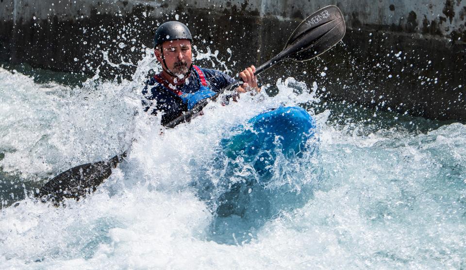 Kayakers run the course as training continues, on Saturday June 10, 2023, while Montgomery Whitewater prepares for its July opening in Montgomery, Ala. 
