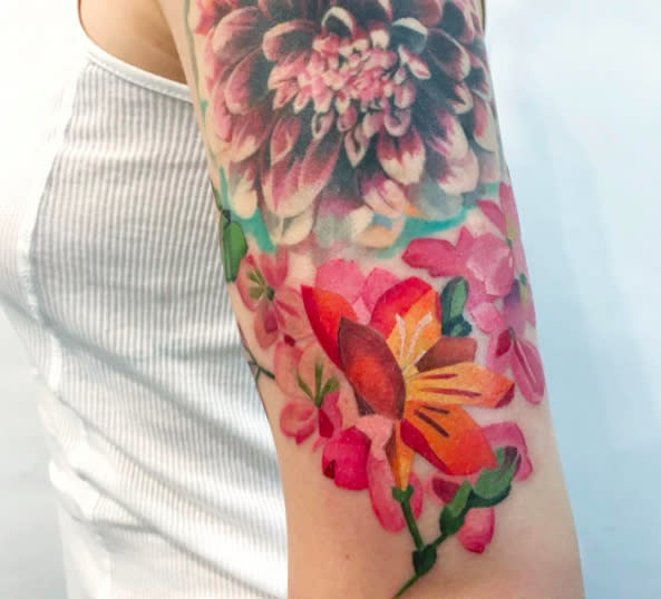 OMG this artist uses *real* flowers to create tattoos, and we are obsessed