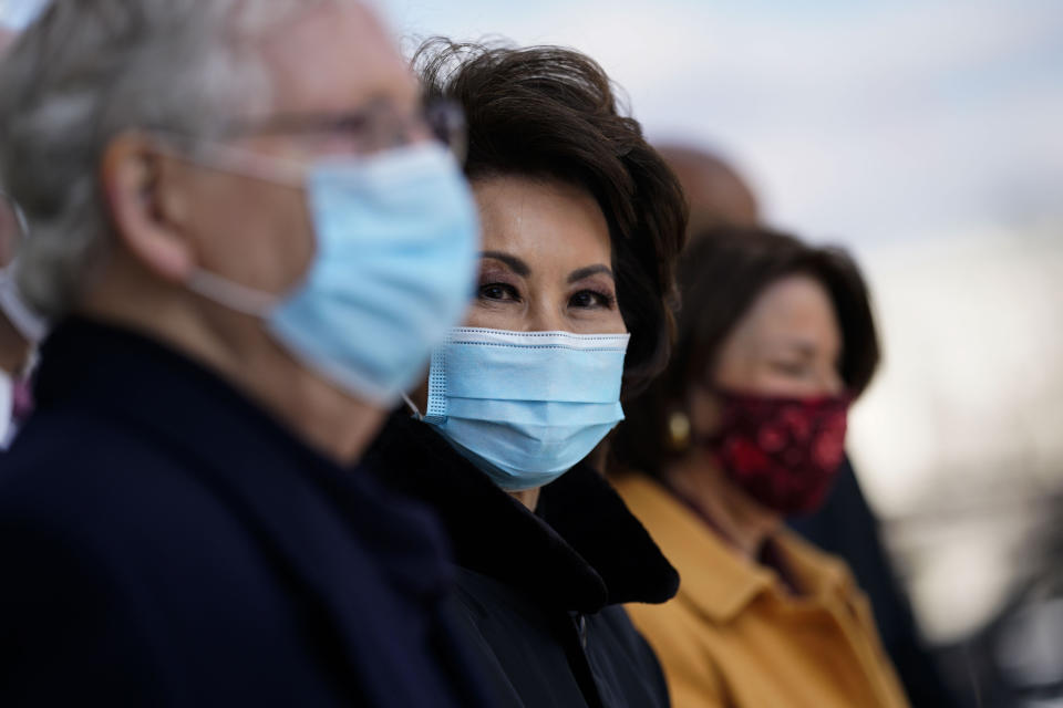 Sen. Mitch McConnell and former Secretary of Transportation Elaine Chao attend the inauguration of President Joe Biden on Jan. 20. (Photo: MELINA MARA/POOL/AFP via Getty Images)