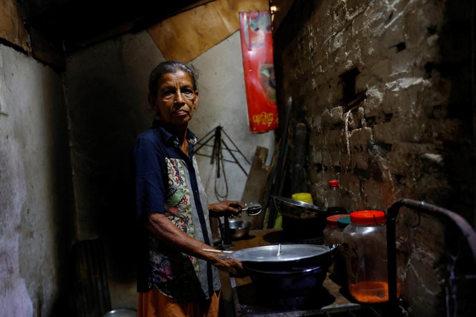 Manel Peiris, 68, in her kitchen. ‘I am a heart patient and have to take medicine every day,’ she says. ‘Hospitals used to issue medicine for three months. But, with the onset of the economic crisis, hospitals don’t have medicine and so we are asked to buy from pharmacies.’ (Reuters)