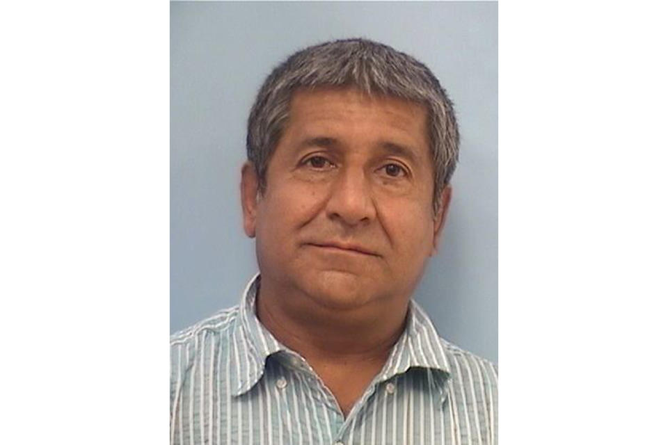 This photo released Tuesday, Aug. 9, 2022, by the Albuquerque Police Department shows Muhammad Syed. Syed, 51, was taken into custody Monday, Aug. 8, 2022, in connection with the killings of four Muslim men in Albuquerque, New Mexico, over the last nine months. He faces charges in two of the deaths and may be charged in the others.<span class="copyright">Albuquerque Police Department/AP</span>