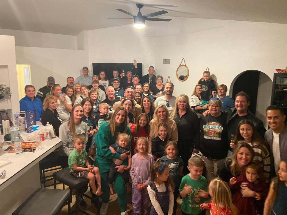 Family and friends of South Dakota State alum and Philadelphia Eagles tight end Dallas Goedert take a group shot ahead of Super Bowl 57 at an Airbnb in Phoenix on Saturday, Feb. 11, 2023.