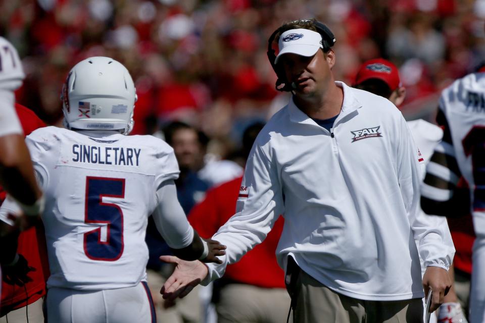 MADISON, WI – SEPTEMBER 09: Head coach Lane Kiffin of the Florida Atlantic Owls congratulates Devin Singletary #5 after scoring a touchdown in the second quarter against the Wisconsin Badgers at Camp Randall Stadium on September 9, 2017 in Madison, Wisconsin. (Photo by Dylan Buell/Getty Images)