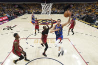 Denver Nuggets forward Michael Porter Jr. (1) shoots next to Miami Heat center Bam Adebayo during the first half of Game 1 of basketball's NBA Finals, Thursday, June 1, 2023, in Denver. (Kyle Terada/Pool Photo via AP)