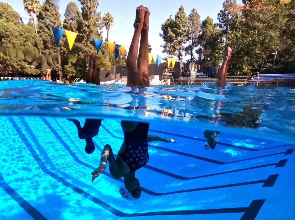 The U.S. Artistic Swimming team takes part in a recent practice at UCLA.