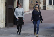 Sophie, Countess of Wessex with her daughter Lady Louise Windsor, walk out of Windsor Castle in Windsor, England, Friday, April 16, 2021. Prince Philip husband of Britain's Queen Elizabeth II died April 9, aged 99, his funeral will take place Saturday at Windsor Castle in St George's Chapel. (AP Photo/Alastair Grant)