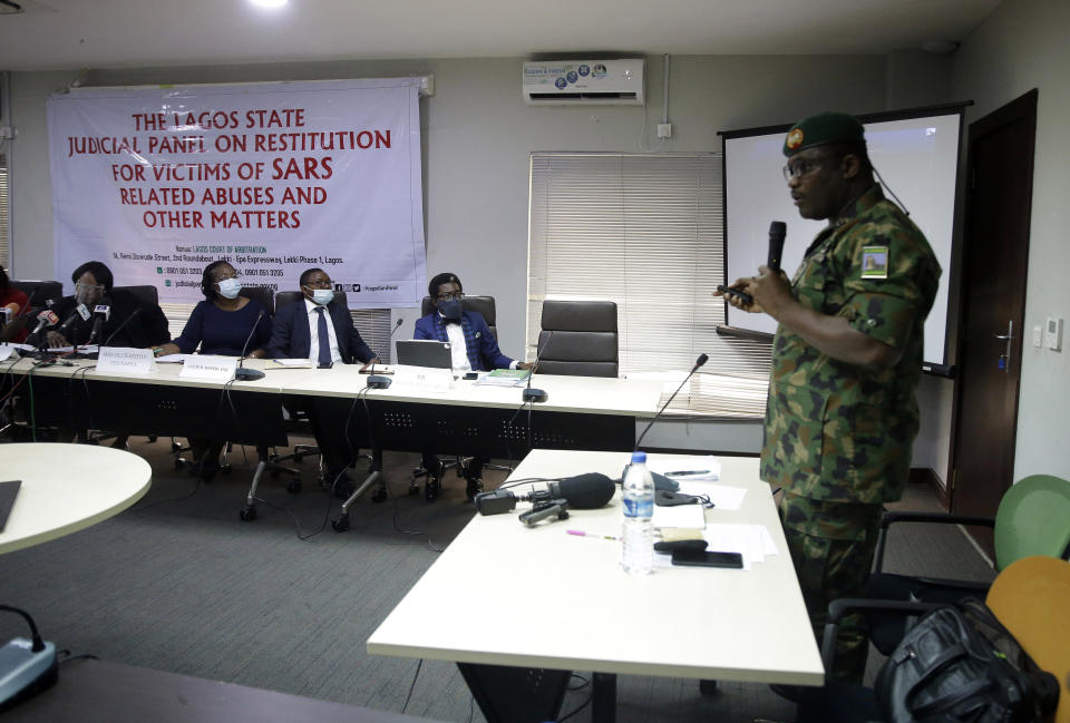 FILE - Brig. Gen. Ahmed Taiwo, Commander of the 81 Military Intelligence Brigade, speaks to a judicial committee in Lagos Nigeria, on Nov. 14, 2020. In a report submitted to Lagos Governor Babajide Sanwo-Olu on Monday, Nov. 15, 2021, a Nigerian judicial panel has found that soldiers of the Nigerian army "shot, injured and killed" protesters during the Oct. 2020 nationwide demonstrations against police brutality in the country's most populous city Lagos. (AP Photo/Sunday Alamba, File)